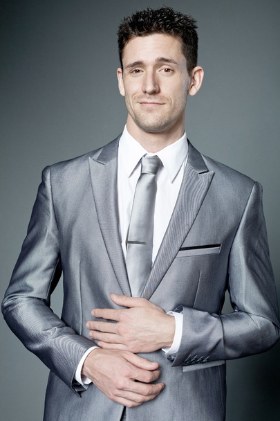 Happy businessman in gray suit. - Foto, Bild