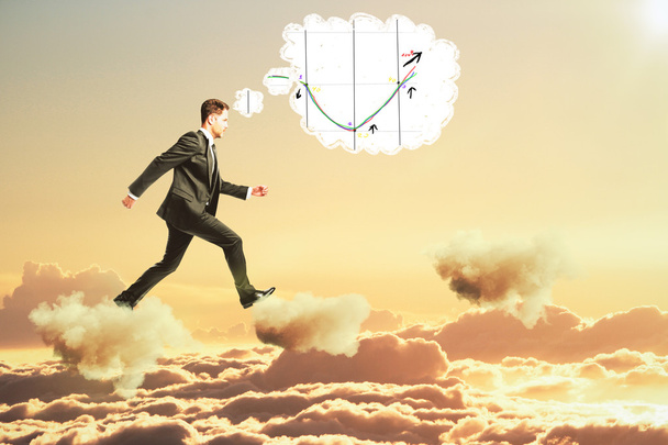 Man thinking about business graph and walking on clouds concept - Photo, Image