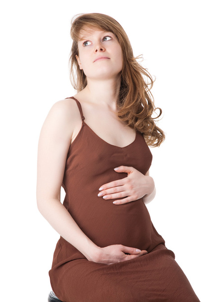 Caucasian woman pregnant on white background - Foto, afbeelding