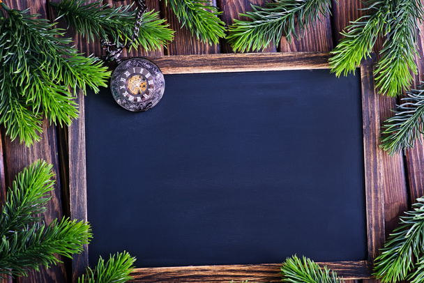 chalkboard and fir tree branches - Foto, Imagen
