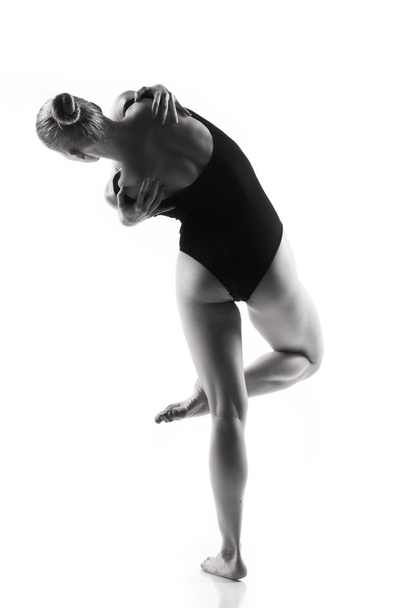 Modern ballet dancer posing on white background - Foto, Imagem
