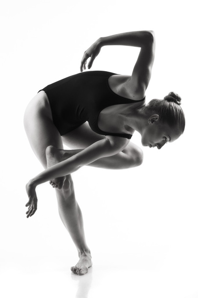 Modern ballet dancer posing on white background - Zdjęcie, obraz