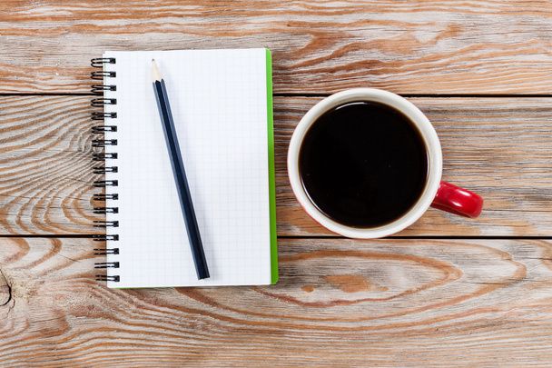 Coffee cup with notebook - Фото, зображення