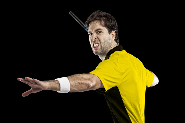 Tennis player with a yellow shirt. - Fotó, kép