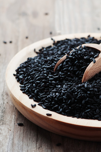 Black uncooked rice - Фото, изображение