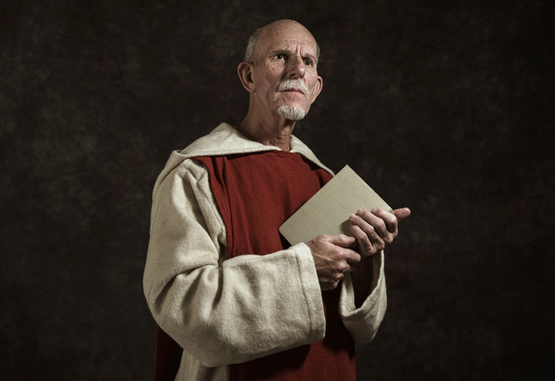 Official portrait of monk holding book. - Photo, Image