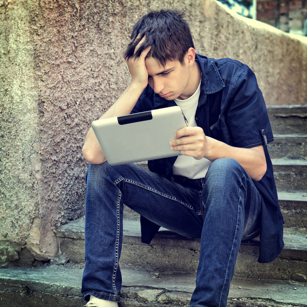Sad Young Man with Tablet - Fotografie, Obrázek