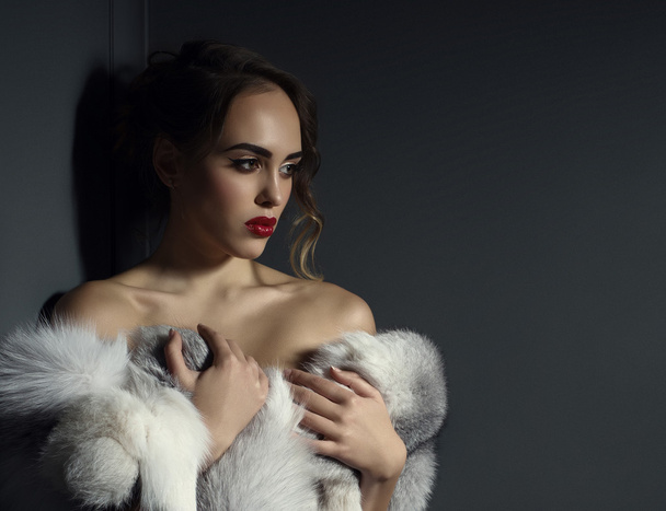 Image of beautiful model posing naked with fur - Foto, Imagen