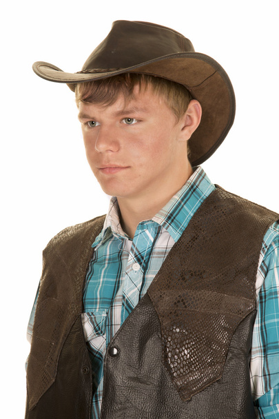 young cowboy in vest look side close - Fotó, kép