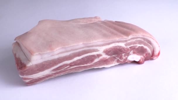 Pork belly on a white background - Video