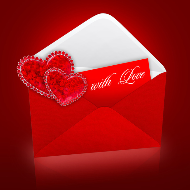 Two decorative hearts are on a postal envelope with a love messa - Fotó, kép
