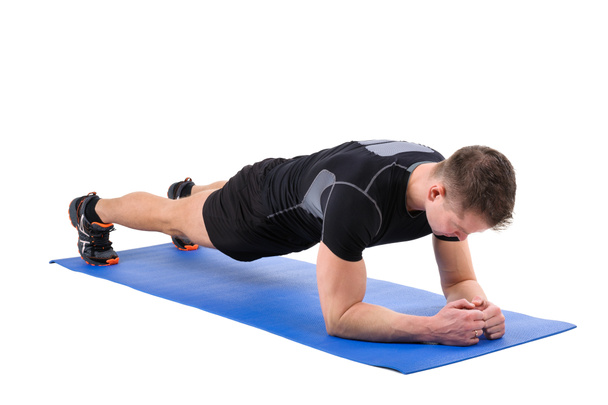 Young man doing Elbow Plank Workout - Zdjęcie, obraz
