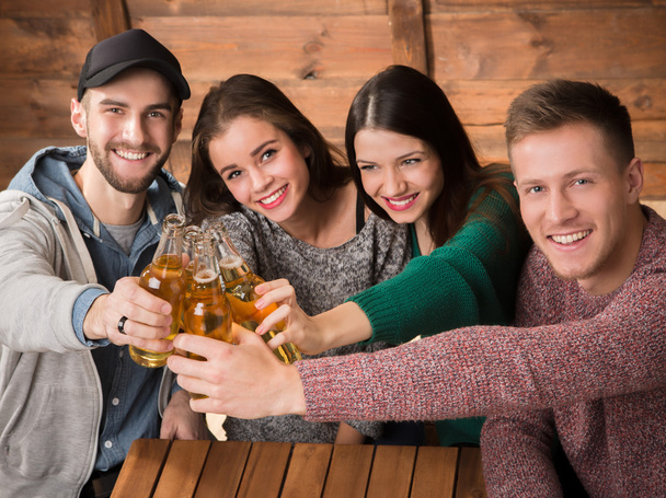 Happy friends resting with alcohol drinks in cafe - Fotografie, Obrázek