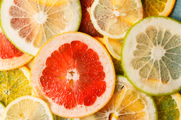 citrus slices background - Foto, afbeelding