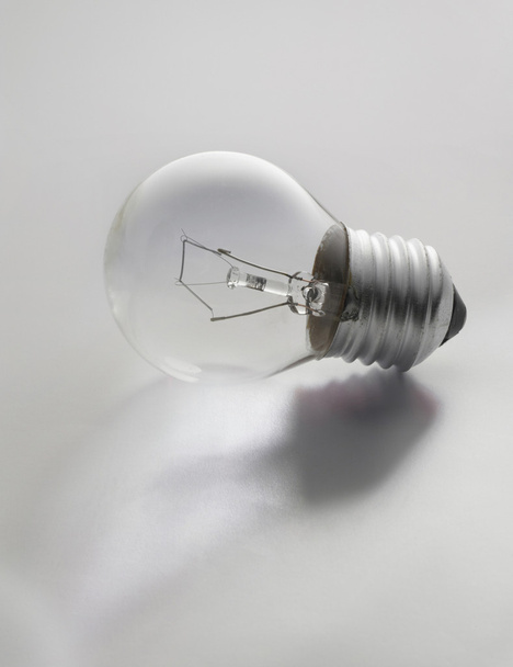 Light bulb on white background. - Photo, image