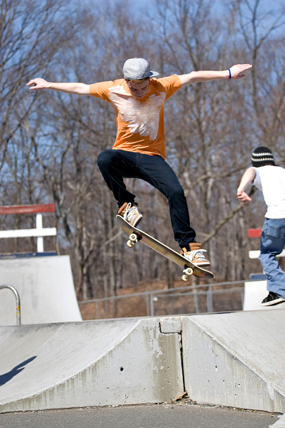 Skateboarder Jumping - Fotó, kép