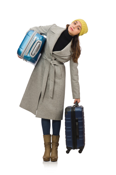 Mujer con maleta lista para las vacaciones de invierno
 - Foto, Imagen