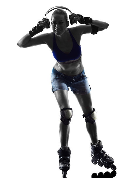 vrouw in rolschaatsen silhouet - Foto, afbeelding