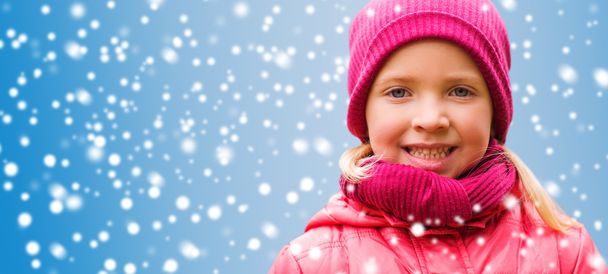 happy little girl portrait over snow background - Valokuva, kuva