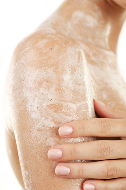 Woman using body scrub - Foto, immagini