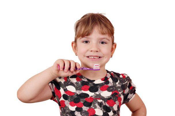 Little girl with tooth brush - 写真・画像