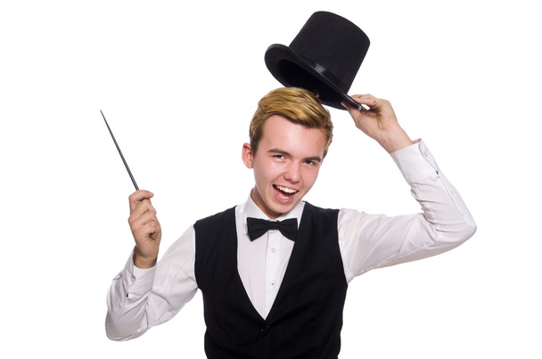 Magician with magic stick isolated on white - Foto, afbeelding