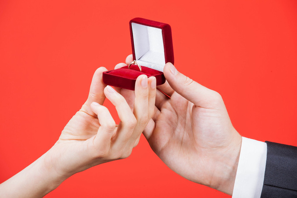 Man presents golden ring for young woman - Fotografie, Obrázek