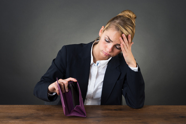 Sad Businesswoman Holding Empty Purse - Photo, image