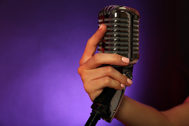 hand holding retro microphone - Photo, Image