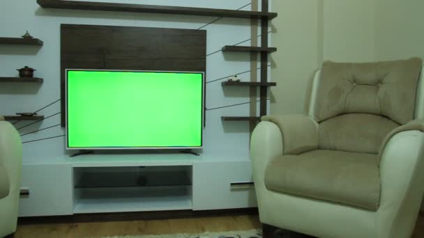 τηλεόραση τηλεχειριστήριο και πράσινη οθόνη - Πλάνα, βίντεο