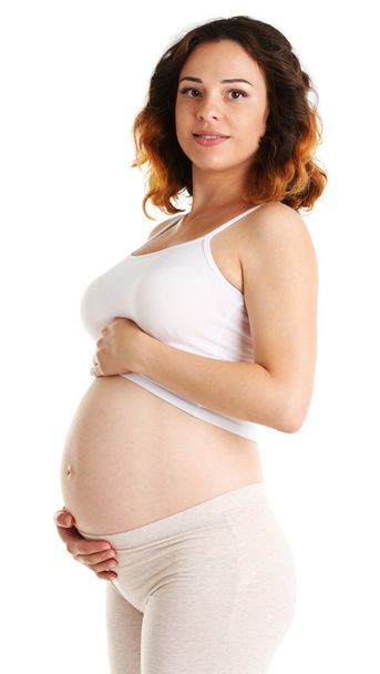 Young happy pregnant woman isolated on white background - Фото, зображення