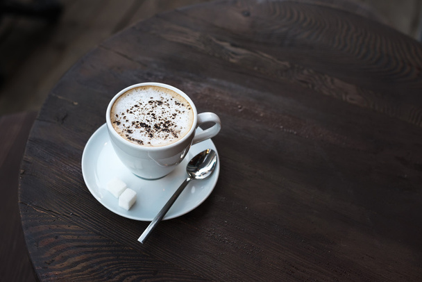 Cup of cappuccino on old - Φωτογραφία, εικόνα