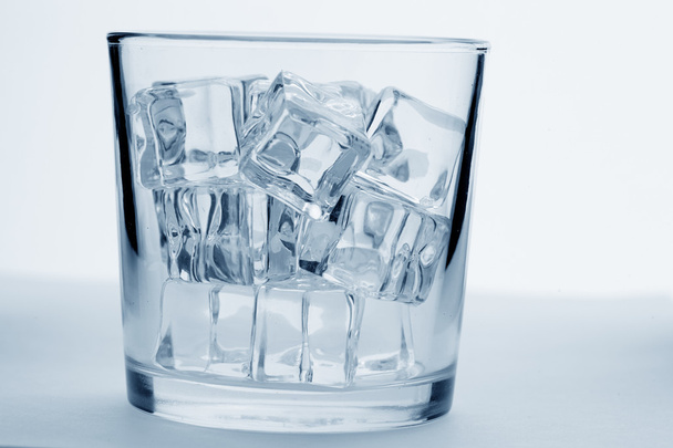 Glass with ice cubes - Фото, изображение