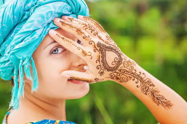 Woman  painted with henna - 写真・画像