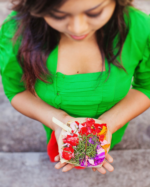 balinese girl holding dry flowers - Photo, Image