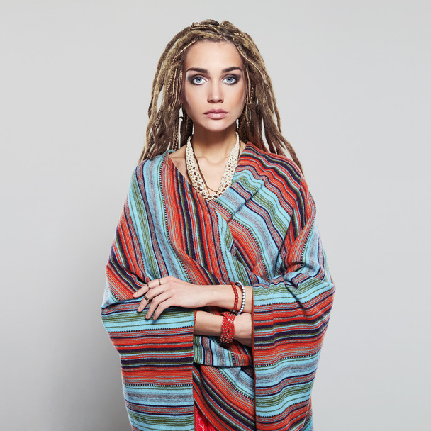 beautiful girl with dreadlocks. pretty young woman with braids African hairstyle hippie - Фото, зображення