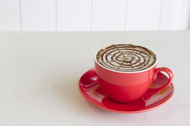 Uma xícara de café vermelha
 - Foto, Imagem