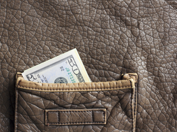 money in the brown leather bag - Photo, Image