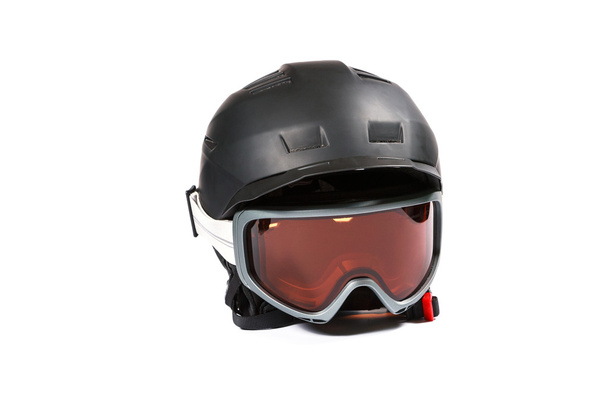 Black ski and snowboard helmet and glasses - Photo, Image