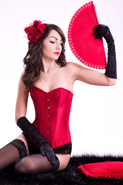 Sexy young woman in black red corset - Foto, Bild
