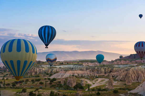 Hot air balloon flying over Cappadocia, Turkey - Foto, afbeelding