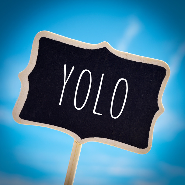 Schild mit dem Wort yolo - Foto, Bild
