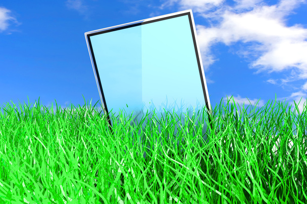 Tablet PC in the Grass - Foto, afbeelding