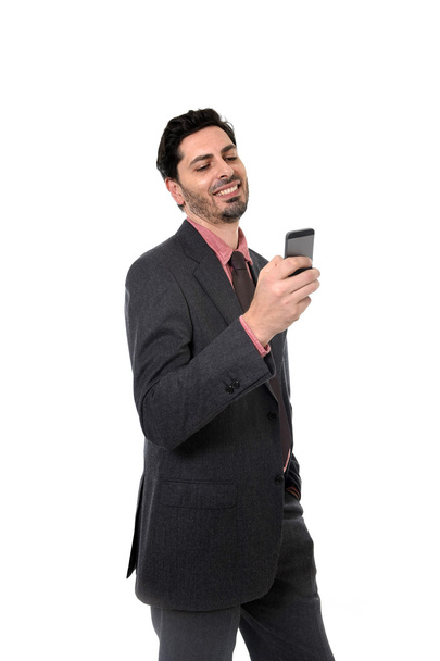 corporate portrait of young attractive businessman of Latin Hispanic ethnicity with mobile phone - Fotografie, Obrázek