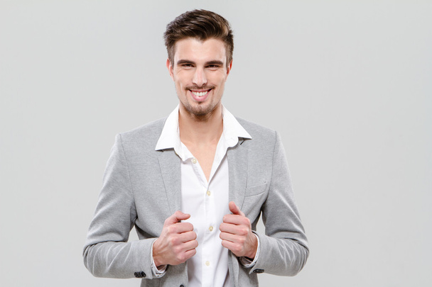 Portrait of young happy successful businessman - Foto, afbeelding