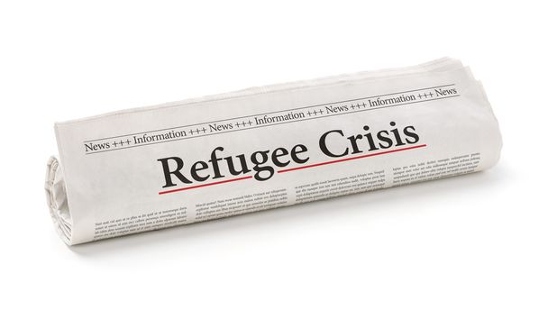 Rolou jornal com a manchete Crise de refugiados
 - Foto, Imagem