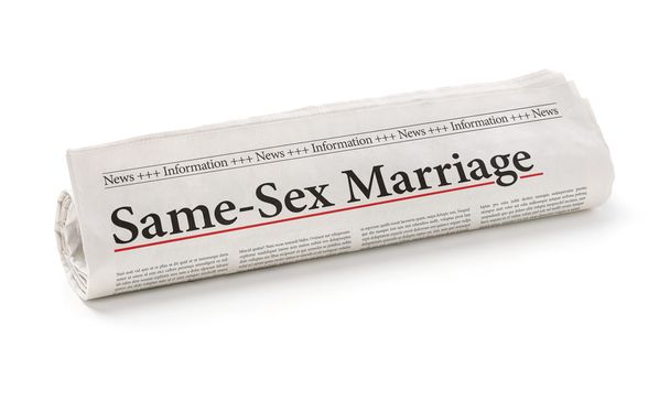 Giornale arrotolato con il titolo Matrimonio omosessuale
 - Foto, immagini