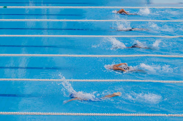 змагання з плавання, стрибок у старт
 - Фото, зображення