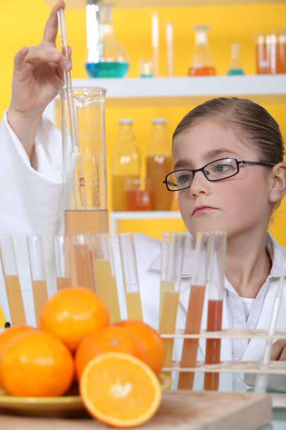 Schoolgirl dressed as biologist - Foto, imagen