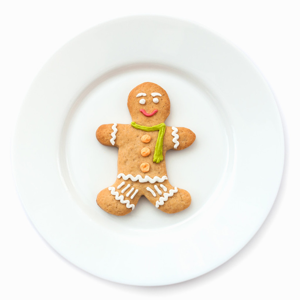 Gingerbread man on the plate. - Photo, Image